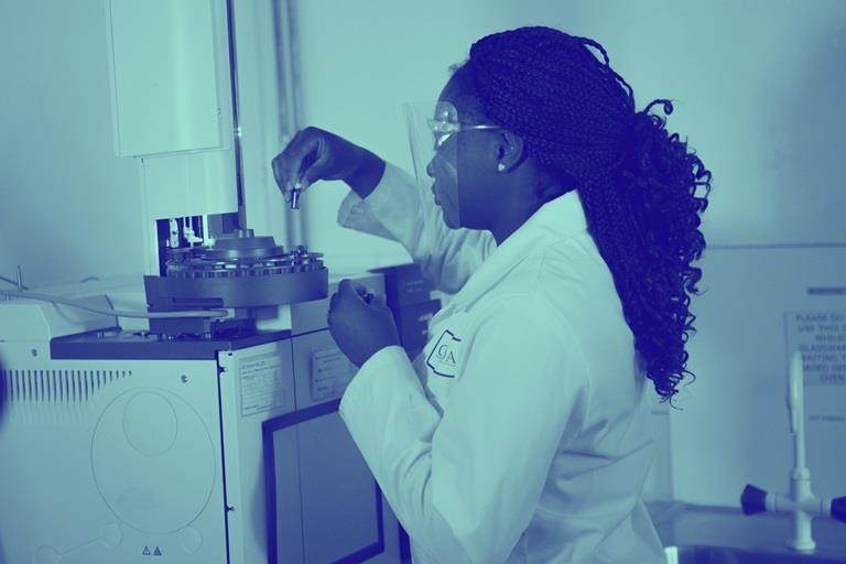 female in lab with blue wash over image