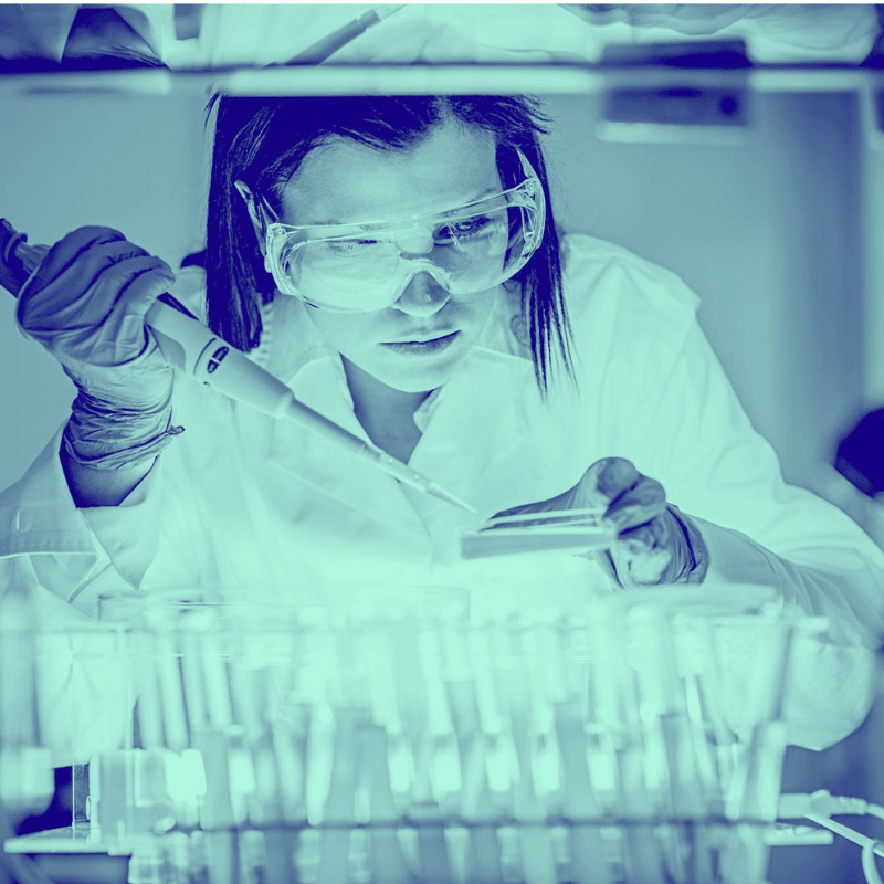 Blue washed image of female in lab