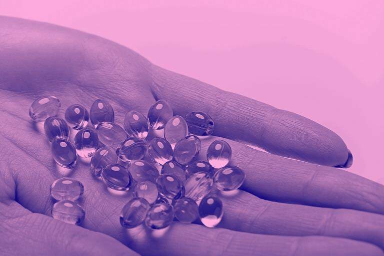 Softgels in hand, with the CH filter.