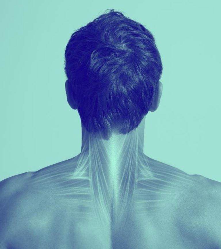 Blue washed image of male from the back