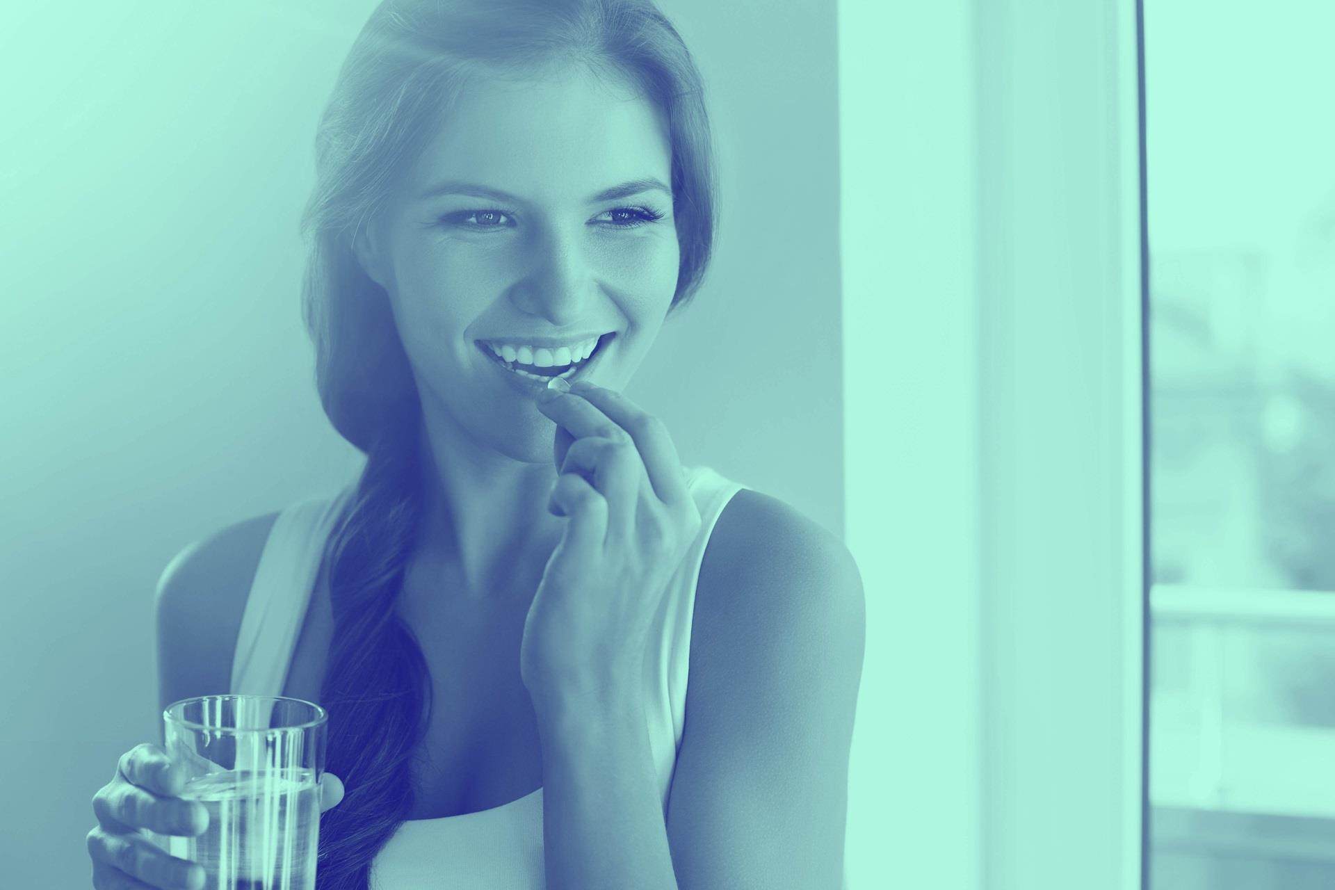 women taking nutritional supplements