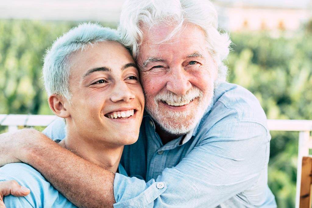 Father and son or grandfather and grandson together
